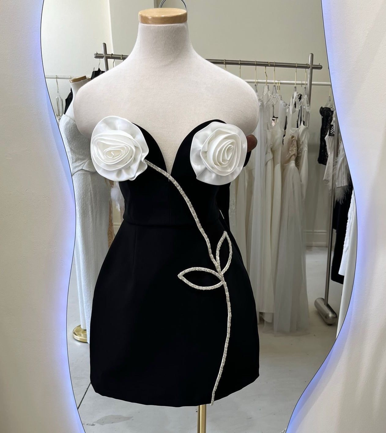 BLACK MINI DRESS WITH TWO LARGE SATIN ROSETTES