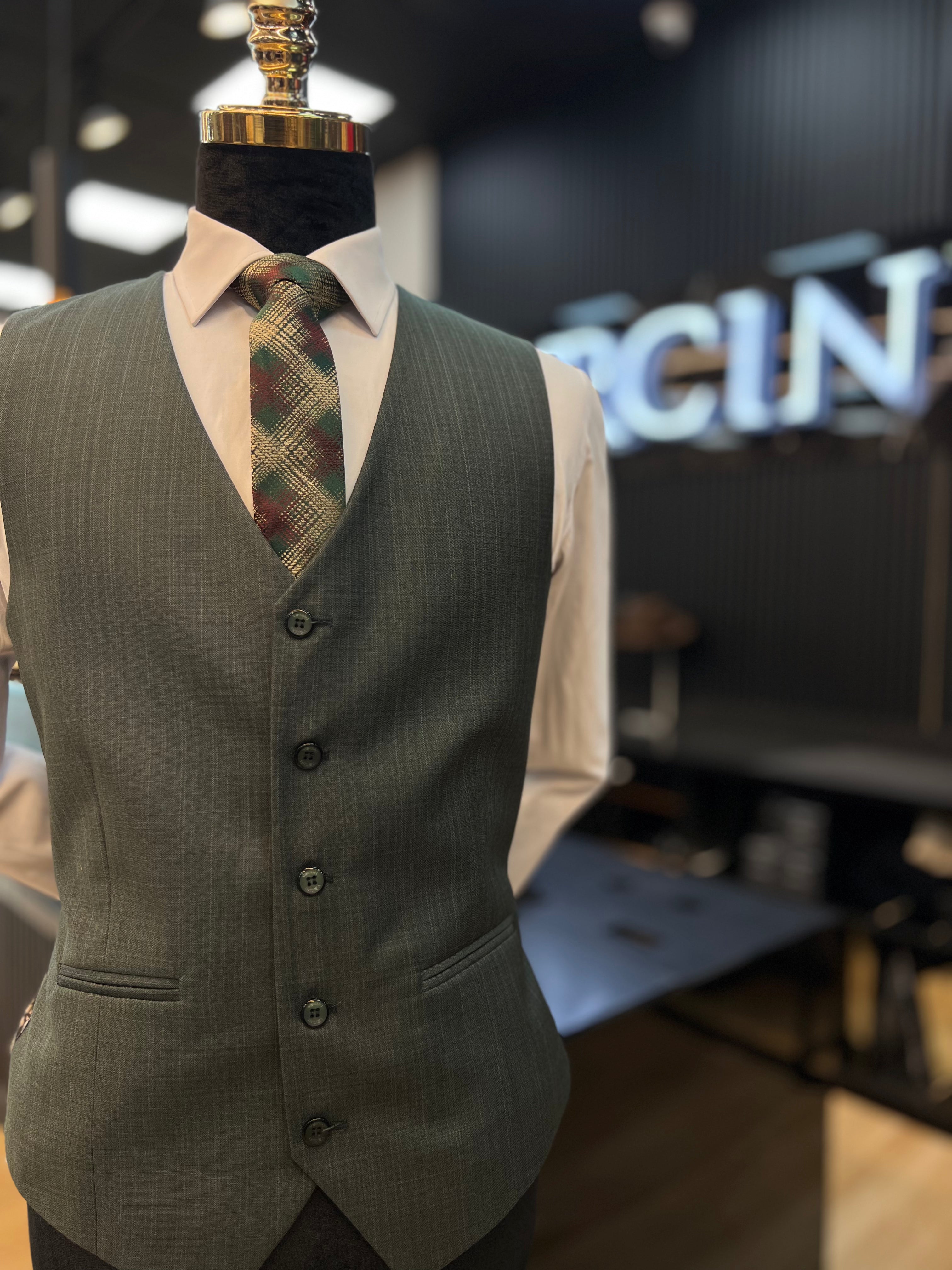 Refined Elegance: Light Green 3-Piece Suit with Subtle Stripes