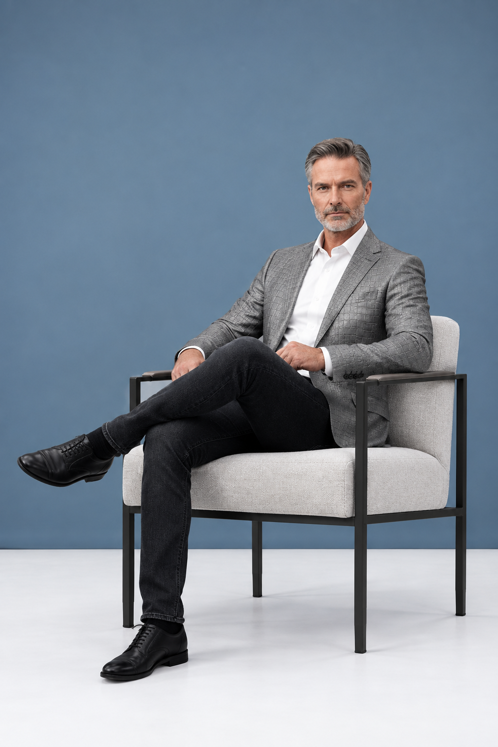 Gray jacket seated pose