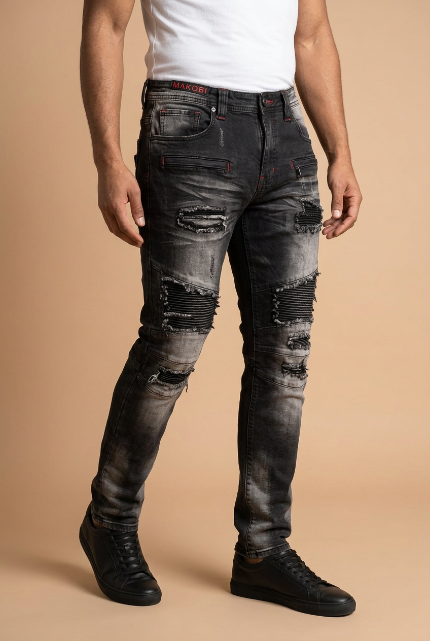 Male model in three-quarter pose wearing distressed jeans
