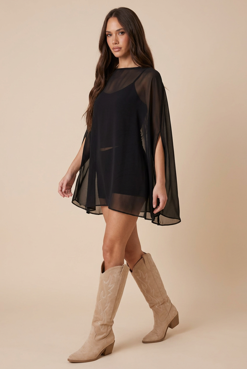 See-through black top walking pose