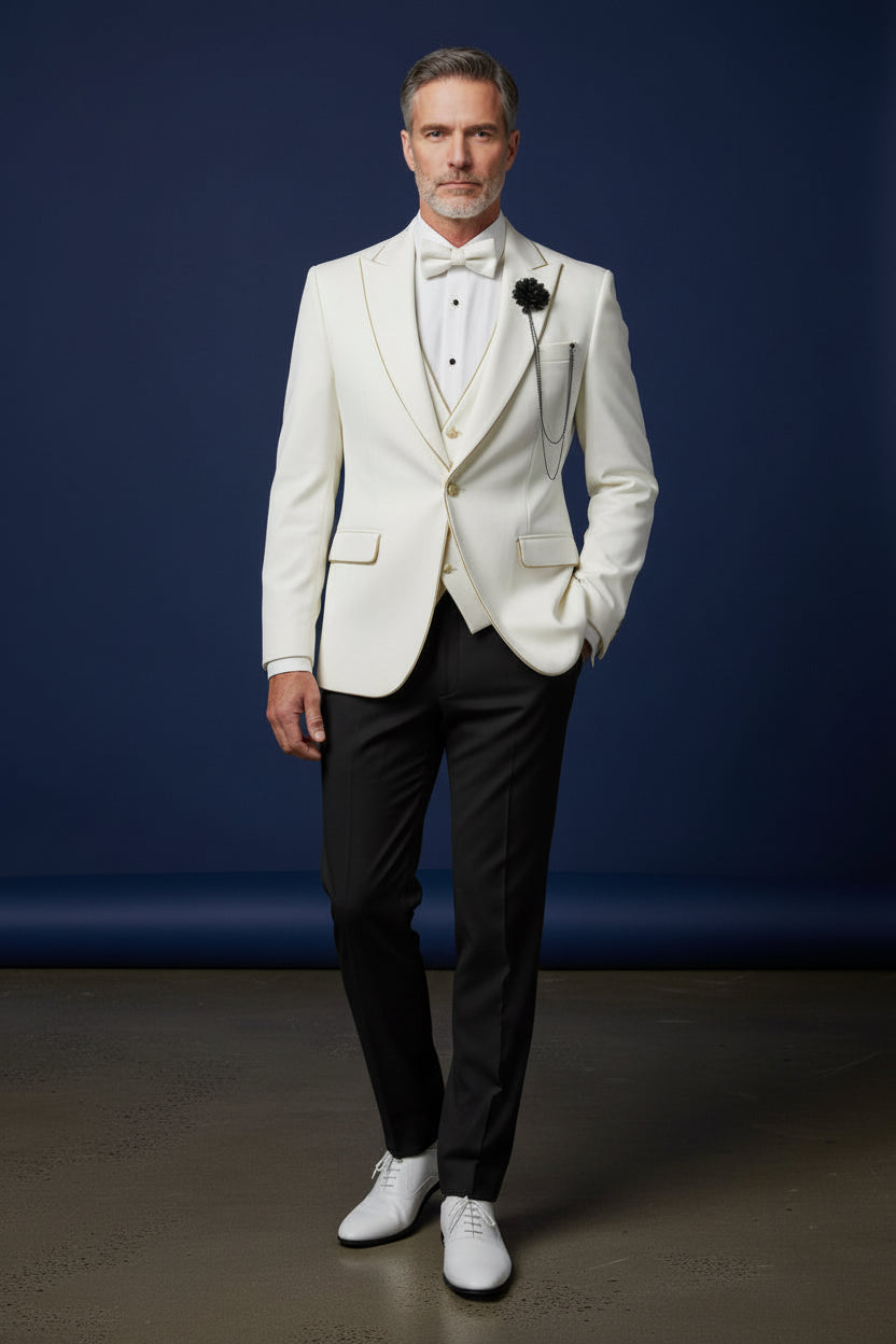 Man wearing a white suit with a blue background