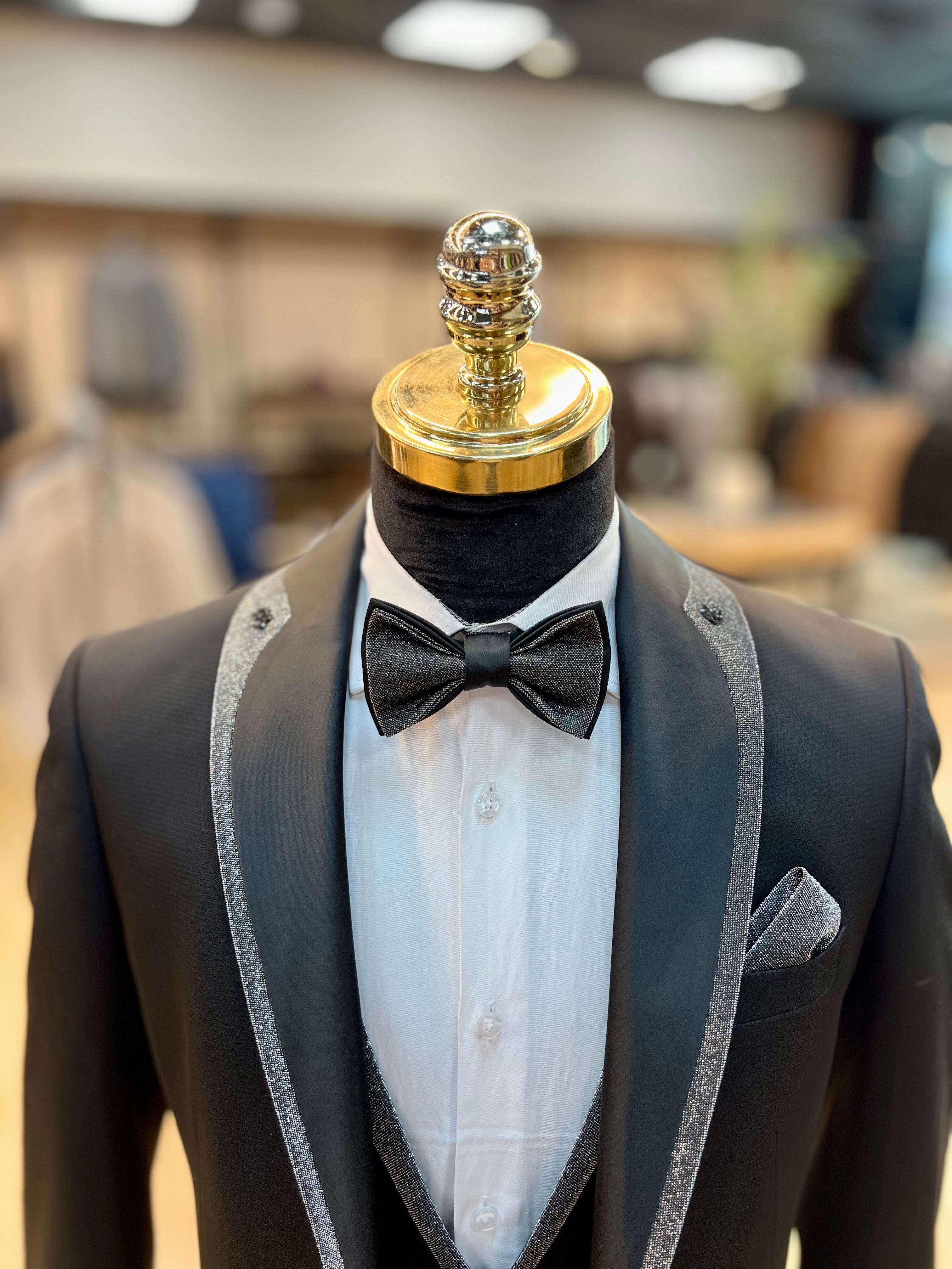 Vercini Evening Tuxedo featuring a sleek shawl lapel adorned with a striking shiny red trim.g