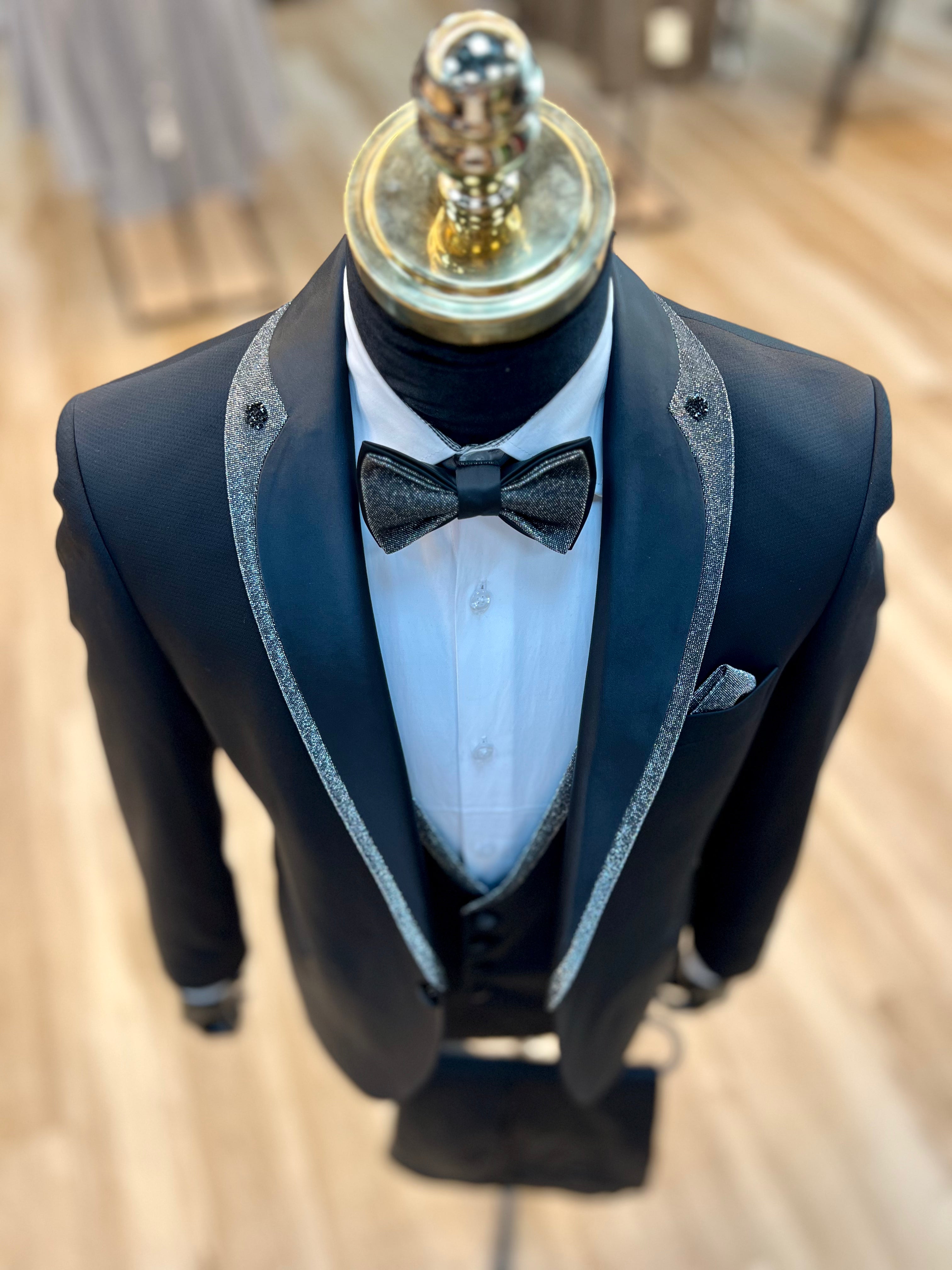 Vercini Evening Tuxedo featuring a sleek shawl lapel adorned with a striking shiny red trim.g