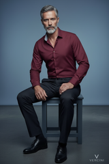 Burgundy shirt seated