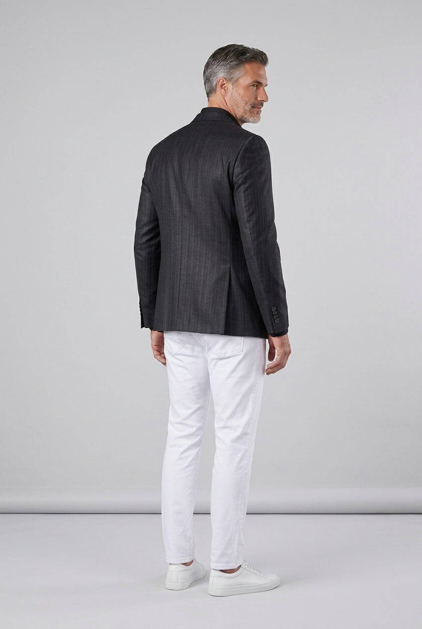 Rear pose with light gray background